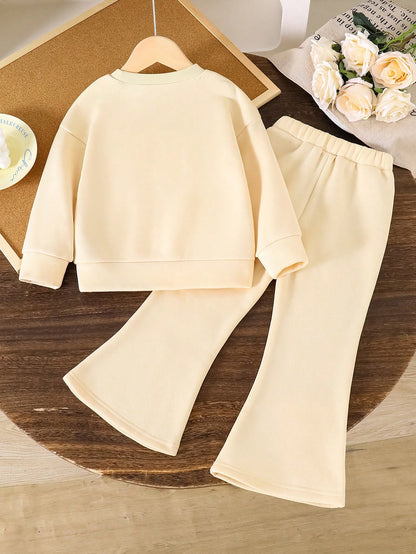 Ensemble de haut col rond d'enfant en bas âge à décor floral et pantalon évasé