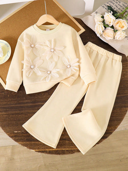 Ensemble de haut col rond d'enfant en bas âge à décor floral et pantalon évasé